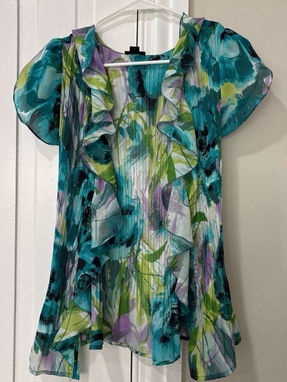East 5th Teal, Green & Purple Ruffled Flutter Blouse - first button hole broken
